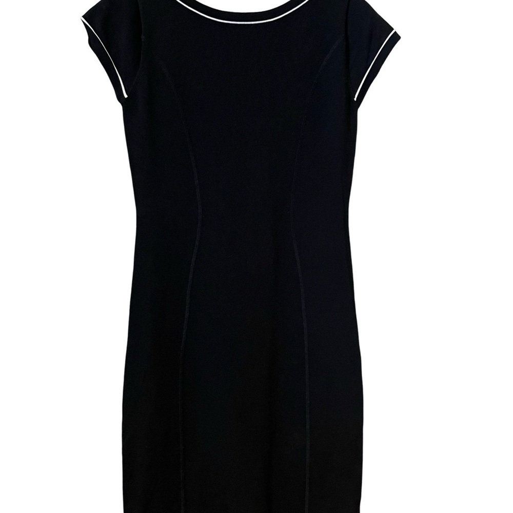 Slim figure hugging little black dress